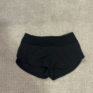 Used black lululemon shorts LR size 2 with 2.5 length